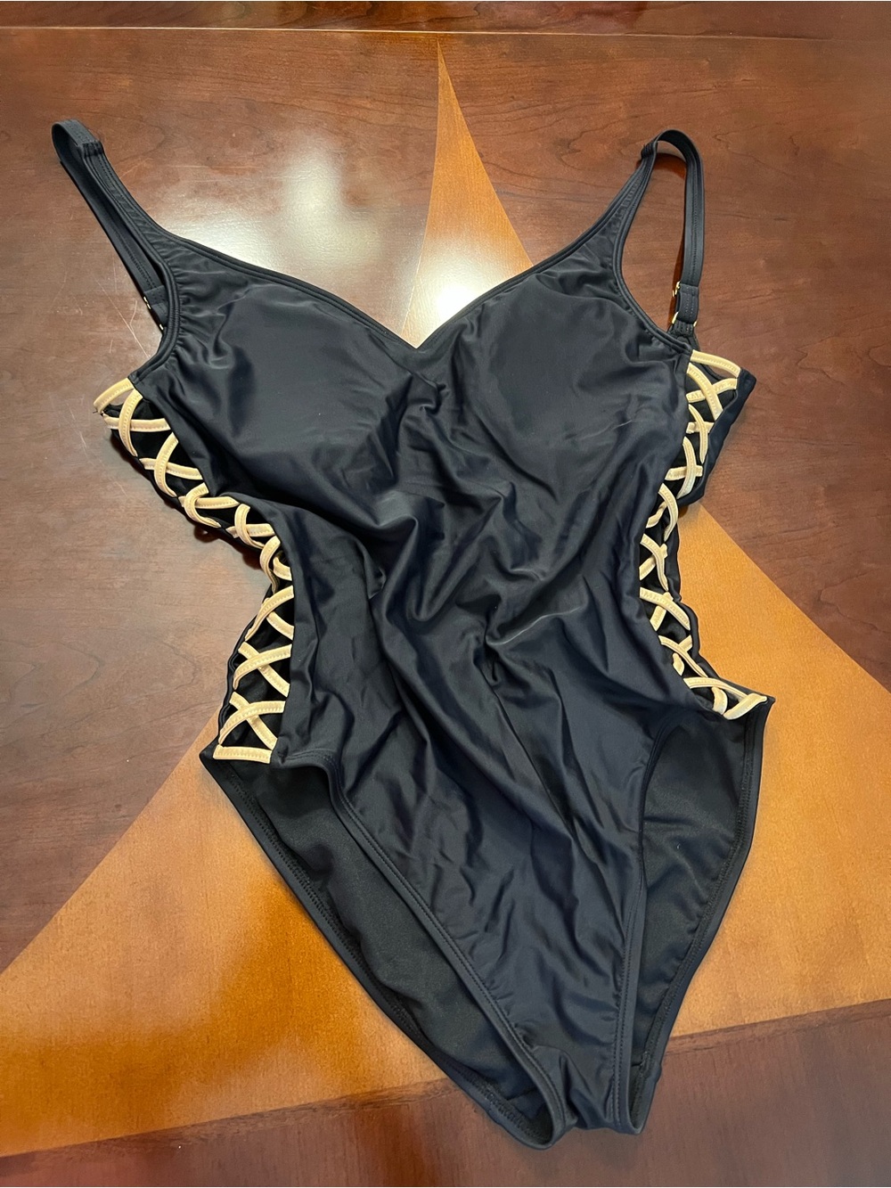 Black One-Piece Swimsuit with Tan Lattice Side Detail